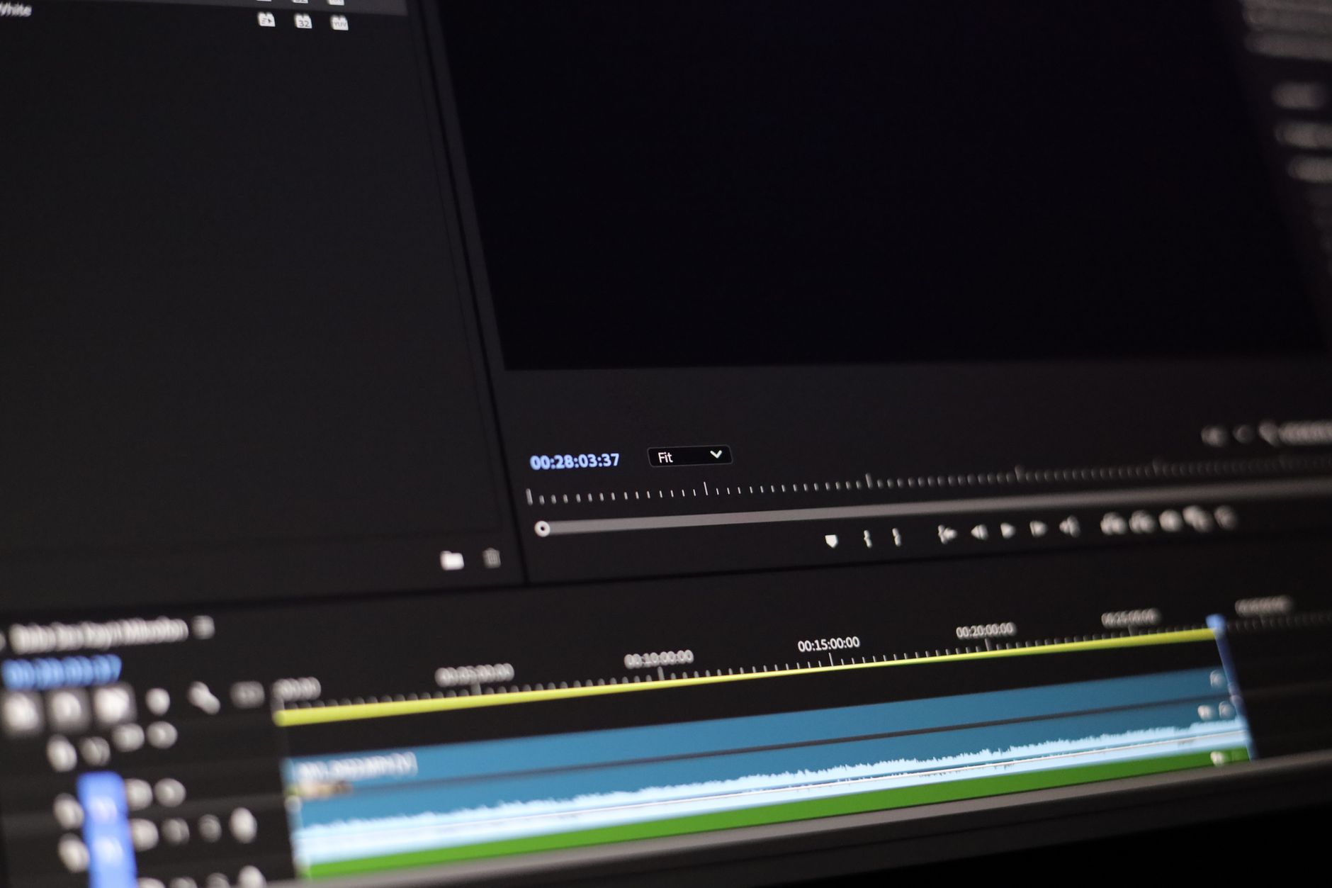 Smartphone screen showing video editing timeline with captions and clip thumbnails