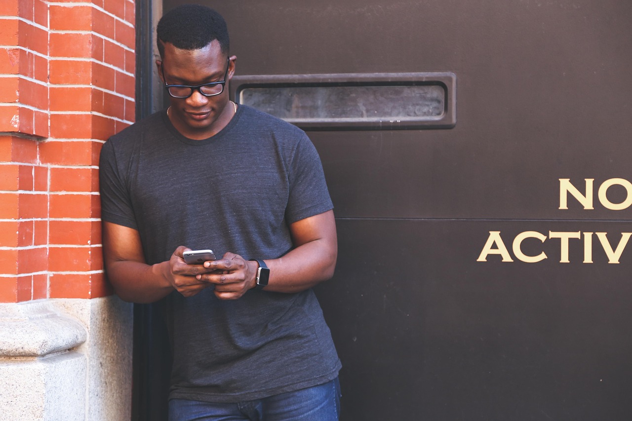 Person holding smartphone with Google AI assistant interface open